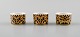 Gianni Versace for Rosenthal. Tre "Barocco" servietringe i porcelæn med 
gulddekoration. Sent 1900-tallet. 
