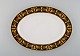 Gianni Versace for Rosenthal. Oval "Barocco" porcelain dish / tray with gold 
decoration. 20th century.

