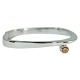 Danish diamond 
jewellery. 
A bangle set 
with a fancy 
coloured 
diamond, 0.40 
ct. mounted in 
14k ...