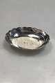 Flower 
decorated 
Silver Bowl  
Measures 11.4 
cm x 8.2 cm(4 
31/64 in x 3 
15/64 in) 
Weight 94.1 gr/ 
...