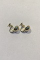 Hermann 
Siersbøl 14K 
Gold Ear 
Rings(Screws) 
Measures 1 cm(0 
25/64 in) Diam 
Combined Weight 
2.5 ...