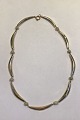 Danish 14K Gold 
Necklace with 
Pearls Measures 
42.5 cm(16 
47/64 in) 
Weight 18.4 
gr/0.65 oz