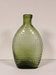 Pocket mark of 
green glass 
Kastrup 
glassworks 
Traces of wear 
No cracks or 
cuts. H. 
15.7cm.