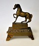 Bronze figure 
of horse on 
plinth, 19th 
century. 
Length: 9.5 cm. 
H.: 12 cm.