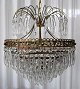 Crystal crown, 
20th century 
Denmark. With 
brass and 
bronze. H: 65 
cm. Diameter: 
36 cm. With 295 
...