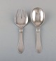 Georg Jensen Continental salad set in hammered sterling silver.
All silver. Dated 1933-44.