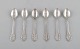 Georg Jensen 
"Lily of the 
Valley". Six 
coffee spoons 
in sterling 
silver / all 
silver. Dated 
...