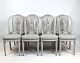 Grey painted 
gustavian 
dining set 
consisting of 
large dining 
table with 4 
extention 
plates and 8 
...