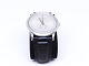 Gucci 
Timepieces 
model 5600M 
wrist watch 
with black 
leather strap 
and of 
stainless 
steel. The ...