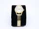 Candino wrist 
watch, case of 
18 ct. gold and 
chain with 7 
rows of 14 ct. 
gold. The watch 
is ...