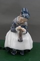 Royal Copemhagen porcelain figurine No 1314, 
Amager girl knitting.
