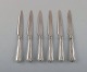 Six "Old 
Danish" fruit 
knives in all 
silver (830). 
Dated 1920's.
Measures: 17 
cm.
In very good 
...