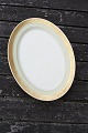 Dagmar with 
gold China 
porcelain 
dinnerware by 
Royal 
Copenhagen, 
Denmark. 
Serving dish 
No 9583 ...