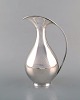 Kay Fisker 1893-1965. Beak jug in sterling silver, pear-shaped body with curved 
handle.