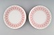 Bjørn Wiinblad for Rosenthal. "Lotus" porcelain service. Two plates decorated 
with pink lotus leaves. 1980s.
