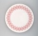 Bjørn Wiinblad for Rosenthal. "Lotus" porcelain service. Large round dish 
decorated with pink lotus leaves. 1980