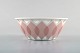 Bjørn Wiinblad 
for Rosenthal. 
"Lotus" 
porcelain 
service. 
Pierced bowl 
decorated with 
pink lotus ...