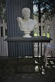 Console table with 4 cm. thick raw granite stone table-top and iron frame with green color.The ...