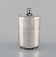 Tore Eldh, Swedish silversmith. Lidded silver container. Minimalist style. Lid 
with enamel work. Dated 1956.
