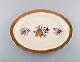 Royal 
Copenhagen 
serving dish in 
porcelain with 
floral motifs 
and gold 
border. Mid 
20th ...