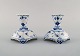A pair of Royal Copenhagen Blue Fluted Full Lace candle holders in porcelain. 
Model Number 1/1138.
