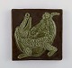 Otto Klaesson for Höganäs. Wall plaque in glazed stoneware with boy and 
crocodile motif. 1970