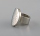 Micke Berggren, Sweden. Modernist designer ring in hammered pewter. Late 20th ...