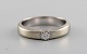 Danish goldsmith. Ring in 14 carat white gold with a brilliant of 0.10 ct. Mid 
20th century.
