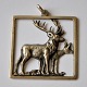 Silver pendant 
with red deer, 
20th century 
Denmark. 
Stamped: S & 
S.4.2 x 4.2 
cm. 
