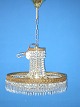 Brass lamp with 
crystal. Height 
85cms. Diameter 
52cms. Fine 
condition. From 
c. 1950-1960