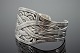 Georg Jensen 
silver 
jewellery. 
Georg Jensen; 
A bangle made 
of sterling 
silver #55. An 
open ...