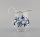 Antique Meissen "Blue Onion" cream jug in hand-painted porcelain. Early 20th 
century.
