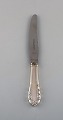 Georg Jensen 
"Lily of the 
Valley" dinner 
knife in 
sterling silver 
and stainless 
steel. Dated 
...