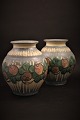 Danico glazed 
stoneware vase 
with floral 
motif. 
H:17cm. 
Dia.:15cm. 
Decoration 
number: ...