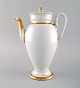 Antique Meissen empire coffee pot with gold decoration. 19th century.
