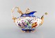 Antique Meissen teapot with gold and flower decoration. 19th century.
