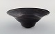 Lucie Rie (b. 1902, d. 1995) Austrian-born British ceramist. Stylish bowl in 
black glazed ceramics. Own workshop, approx. 1970.
