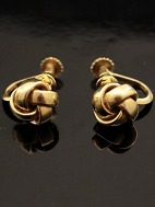 14 carat gold earrings with knot
