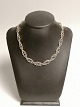 Silver necklace 
830s Bra Length 
42cm Width 1cm. 
Appears in 
pretty used 
condition.