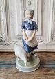 Royal 
Copenhagen 
Figure - Goose 
girl 
No. 527, 
Factory first. 
Height 24 cm.
Design: ...