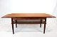 Coffee table in teak with extention leaves of danish design from the 1960s.
5000m2 showroom.