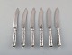 Danish 
silversmith. 
Six antique 
knives in 
silver (830) 
with flower 
chisels. Dated 
1918.
Length: ...