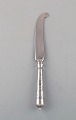 Danish silversmith. Antique knife in silver (830) with flower chisels. Dated 
1915-20.
