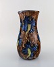 Roskilde 
Lervarefabrik, 
Denmark. Large 
art nouveau 
vase in glazed 
ceramics. Blue 
flowers in ...