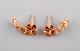 Scandinavian jeweler. A pair of 18 carat gold earrings. Mid 20th century.
