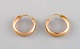 Scandinavian jeweler. A pair of 18 carat gold earrings. Mid 20th century.
