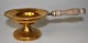 Brass glow bowl 
with handle, 
19th century 
Denmark. With 
decorations on 
the edge. H: 
5.2 cm. ...
