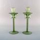 Isfahan Glass. Two candlesticks in green frosted art glass. Late 20th century.
