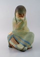 Lladro, Spain. 
Large sculpture 
in glazed 
ceramics. 
Sitting girl. 
1980s.
Measures: 30 x 
21 ...