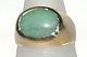 Gold ring with 
green stone, 14 
Karat
Stamp: 585, HU
Goldsmith: 
1962-1972 
Henning ...